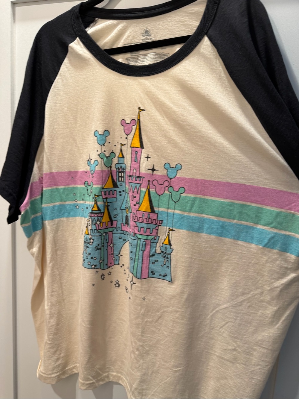 Disney Women’s Castle Graphic Raglan Tee in Cream & Black